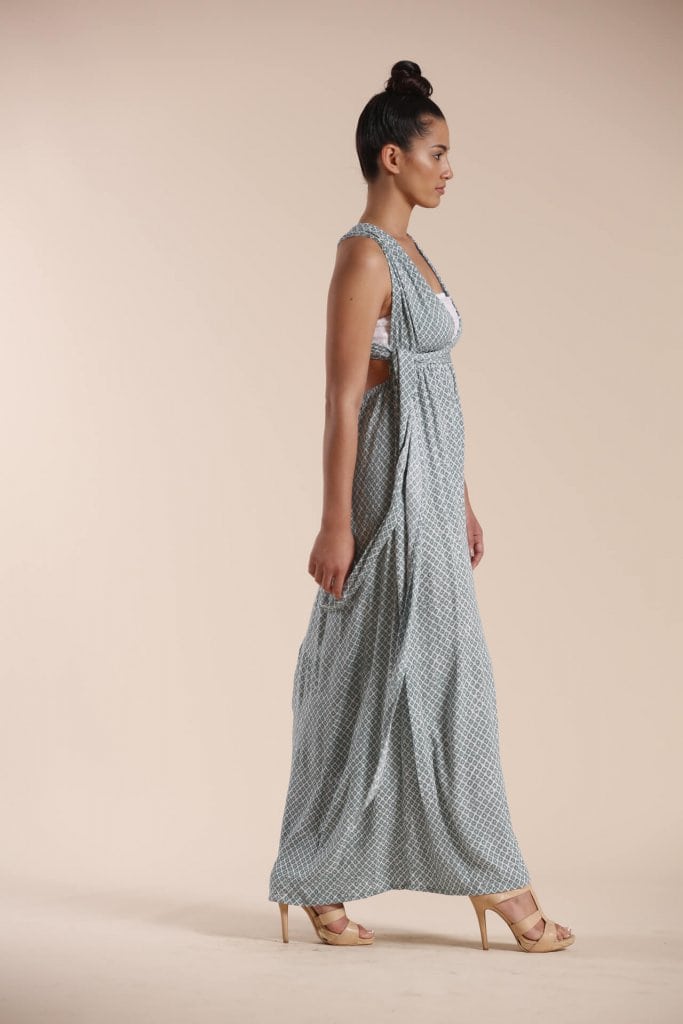 Female model wearing a Maxi Dress in light green - Side View