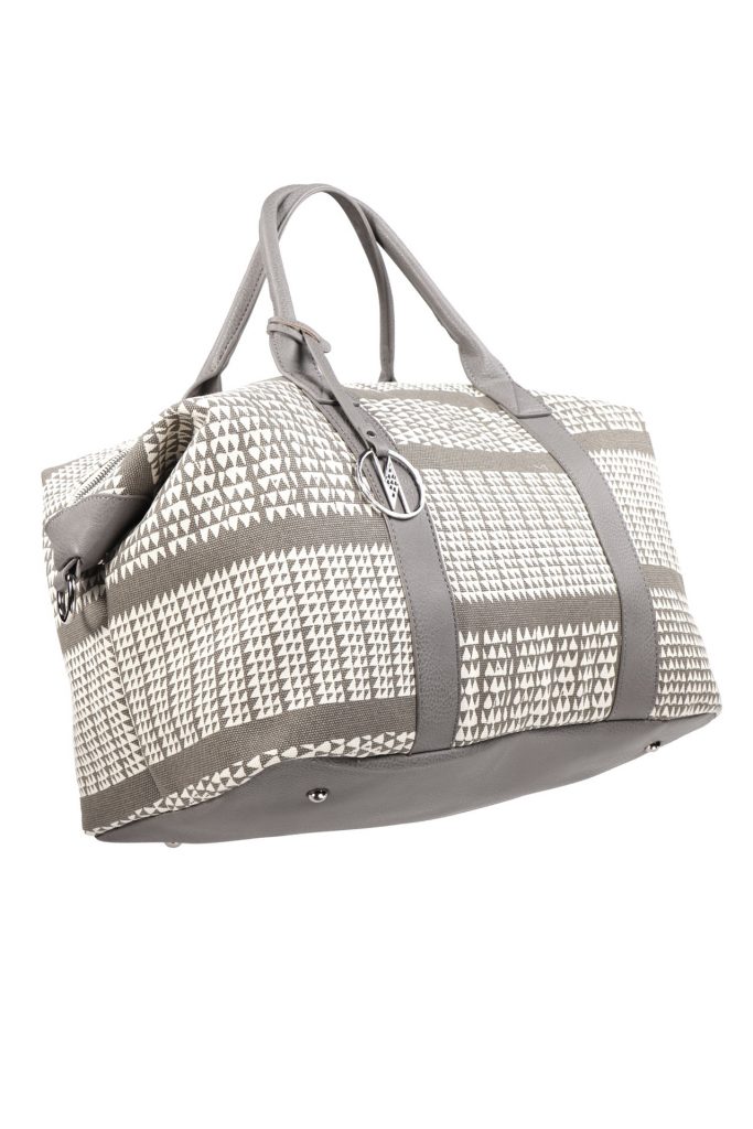 Kaapuni Mini Duffel in a Nihoku Print and Stone Color - Side View